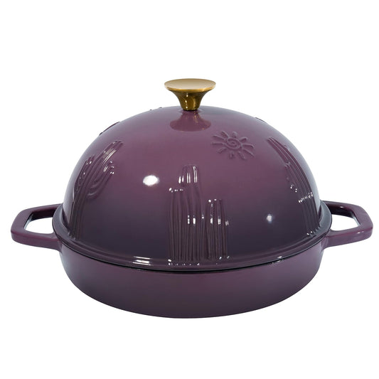 Purple enameled cast iron Dutch oven with a lid on a white background
