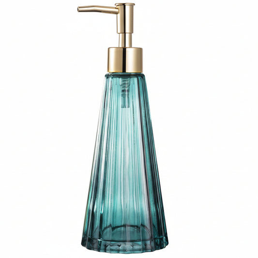 Blue glass soap dispenser with gold pump and vanilla bean on a white background