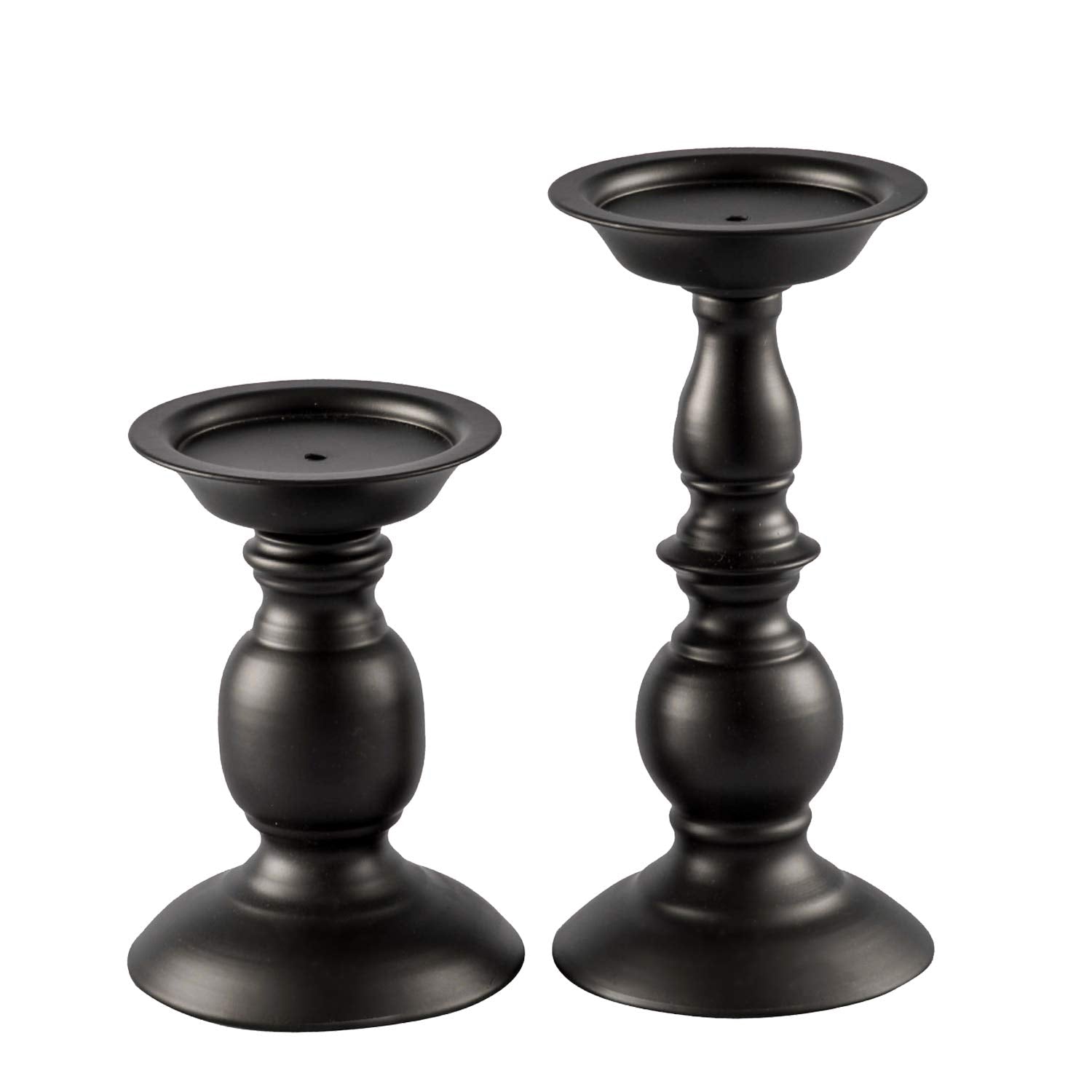 Two black candle holders on a white background
