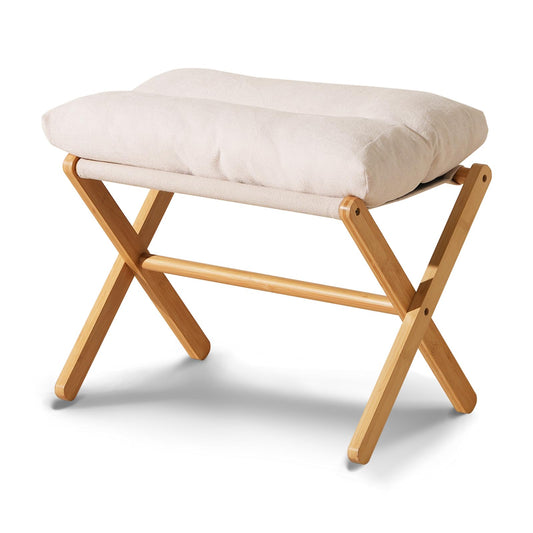 Beige cushioned stool with wooden frame on a white background
